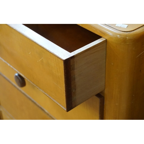 469 - A Late 1930s Blond Maple Haberdashers Chest of Eight Drawers. Measuring: 130cms across x 54cms deep ... 