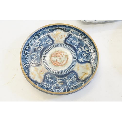 666 - A Hiraldo Porcelain Plate decorated in the Trellis pattern, a Circular Arita Dish decorated with Dra... 