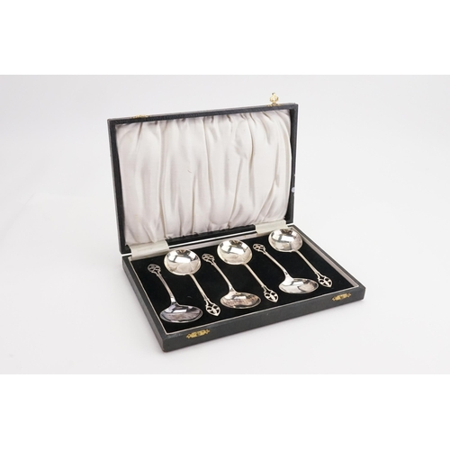 68 - A Silver Plated Cased Set of Soup Spoons.