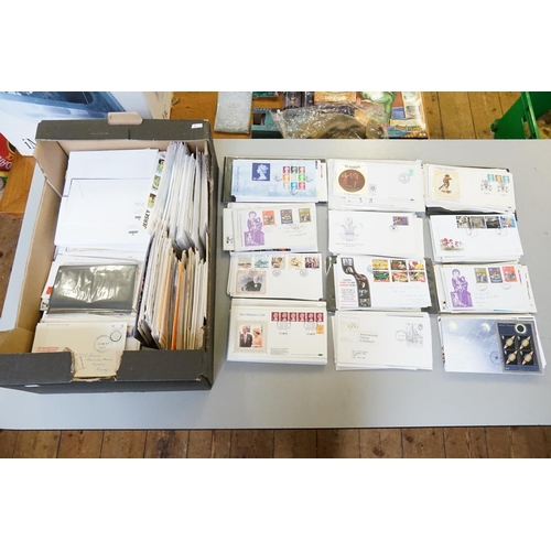 310 - A Box containing 100's of First Day Covers. Needs Viewing.