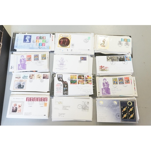 310 - A Box containing 100's of First Day Covers. Needs Viewing.