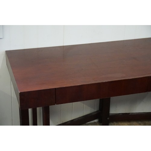 486 - A Modern Mahogany Veneered Table with Two Drawers. Measuring: 161cms across x 71cms deep x 76cms hig... 