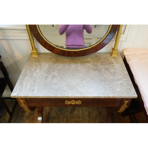 485 - A French Marble Topped & Gold Gilt Dressing Table with Mirror with Brass Columns. Measuring: 80cms a... 