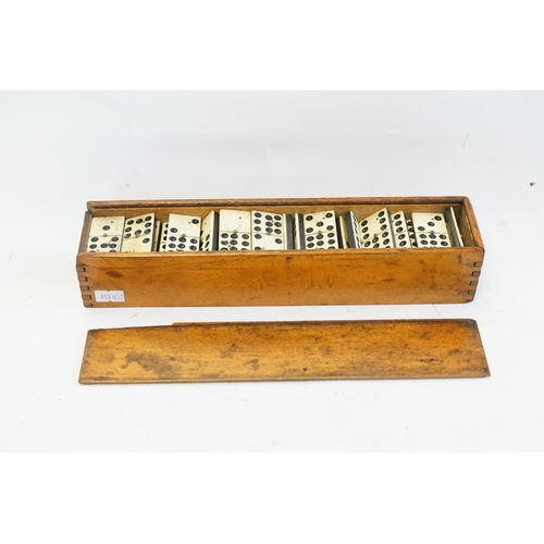 700 - An Antique Bone & Ebony Domino Set in an Original Wooden Box.