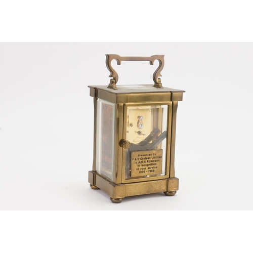 228 - A Mathew Norman of London brass four plate carriage clock, with visible escapement and carrying hand... 