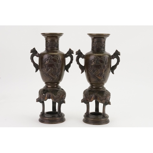 658 - A Pair of Japanese Vases of Archaic with mythological Beast Carvings & resting on a Shaped Base. Mea... 