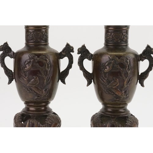 658 - A Pair of Japanese Vases of Archaic with mythological Beast Carvings & resting on a Shaped Base. Mea... 