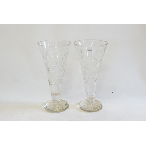 808 - A Pair of Large Cut Glass Trumpet Shaped Vases on Star Cut Bases.