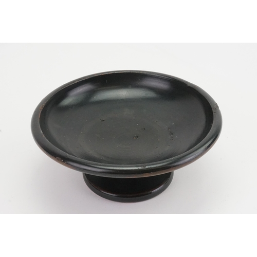 690 - A Black Glazed Terracotta Bodied Shallow Bowl on pedestal base. Ref Number: A2584. Southern Italy, L... 