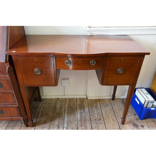 491 - A Victorian Mahogany Serpentine Fronted inlaid Sideboard resting on square spade legs. Measuring: 10... 