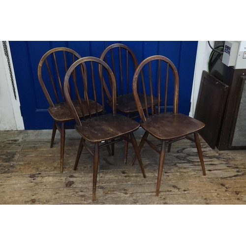 493 - A Set of Four Ercol Stained Turned Back Dining Chairs with cross stretchers & Hoop backs.