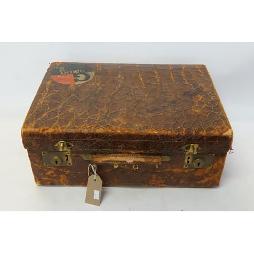 628 - A Crocodile Skin Ladies Luggage Case with an Orient Line Label & Brass Catches. Measuring: 45cms acr... 