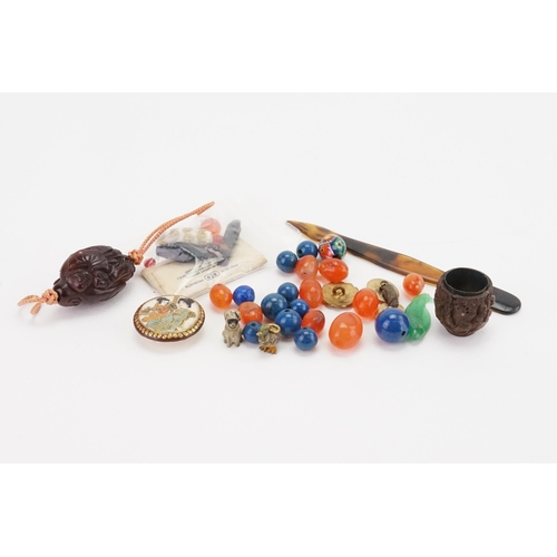 159 - A collection of Costume Beads, Carved Walnut, etc.