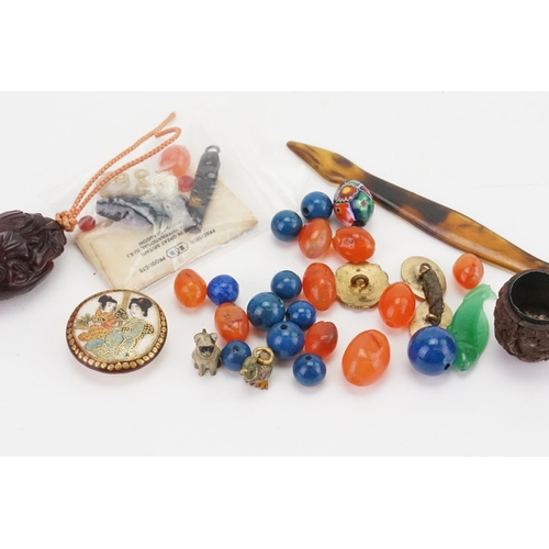 159 - A collection of Costume Beads, Carved Walnut, etc.