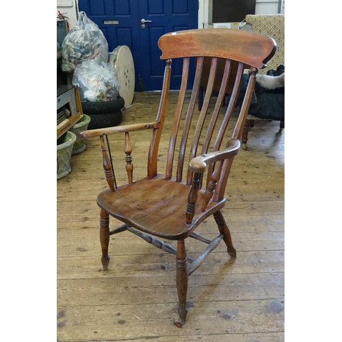 509 - A single stick back chair.