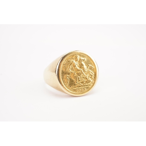 147 - A 1914 half sovereign mounted in 9ct gold ring. Weight 12.8g. Size Z+1.