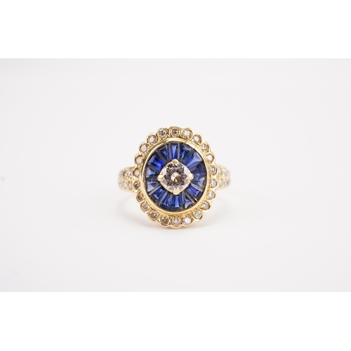 141 - A Art Deco 18ct gold diamond and sapphire set ring, set with sapphire baguettes and brilliant cut di... 