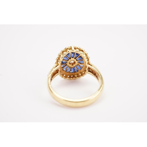 141 - A Art Deco 18ct gold diamond and sapphire set ring, set with sapphire baguettes and brilliant cut di... 