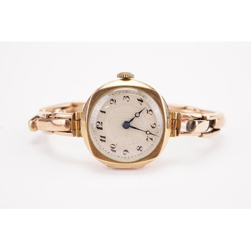 183 - A 9ct gold cased ladies watch, 15 jewel mechanism with expanding strap.