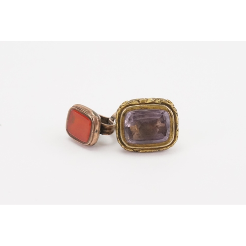 166 - A amethyst set seal, along with an orange stone set seal.