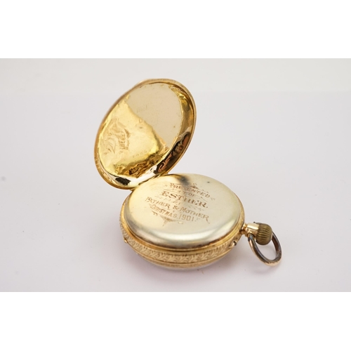 188 - A 18ct gold ladies pocket watch, decorated with floral Victorian etchings. With plated inner cover. ... 