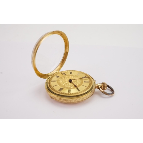 188 - A 18ct gold ladies pocket watch, decorated with floral Victorian etchings. With plated inner cover. ... 