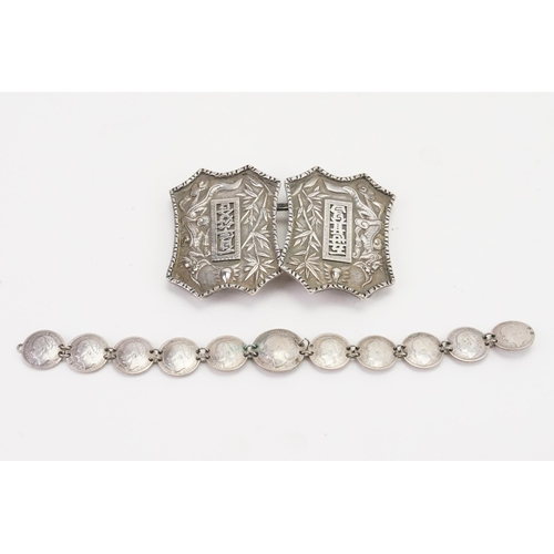 170 - A Chinese hallmarked nurses buckle makers mark WS, along with a coin bracelet. Weight of buckle 44g.