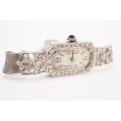 190 - A 1920's ladies art deco platinum and diamond set cocktail watch, platinum mesh strap and diamond se... 