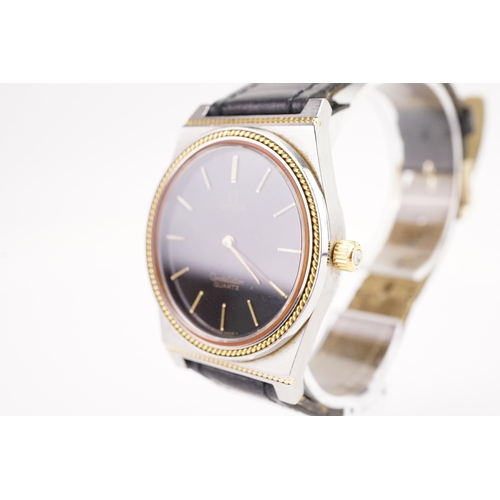 192 - A 1978 Omega constellation 20mm watch, 1351 caliber, quartz movement, Bi metal (steel & gold), black... 