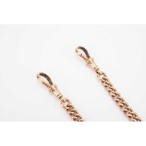 111 - A 9ct gold Albert chain and T bar, with curb link design. All links marked. Weight 37.5g.