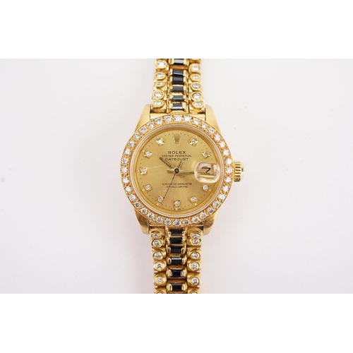 199 - An interesting 18ct gold ladies Rolex oyster date just, circa 1970's. Unique sapphire and diamond oc... 