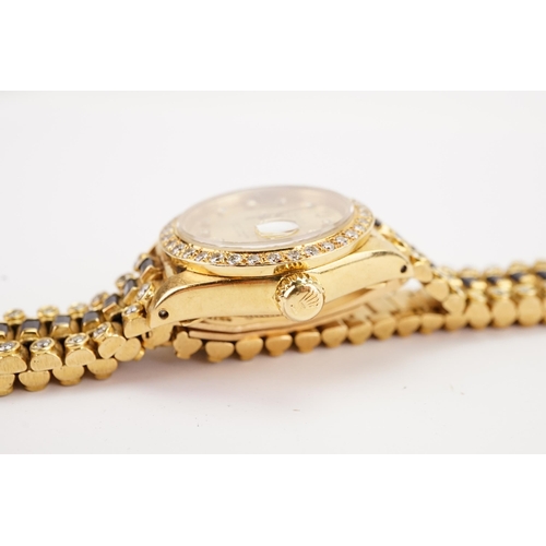 199 - An interesting 18ct gold ladies Rolex oyster date just, circa 1970's. Unique sapphire and diamond oc... 