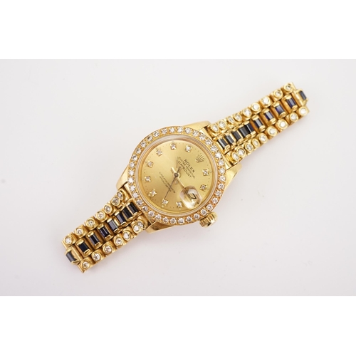 199 - An interesting 18ct gold ladies Rolex oyster date just, circa 1970's. Unique sapphire and diamond oc... 