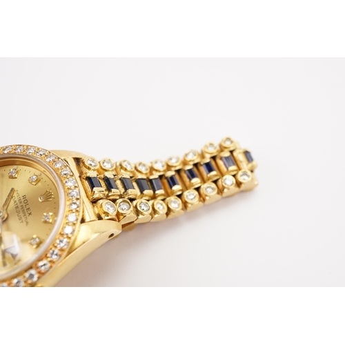 199 - An interesting 18ct gold ladies Rolex oyster date just, circa 1970's. Unique sapphire and diamond oc... 