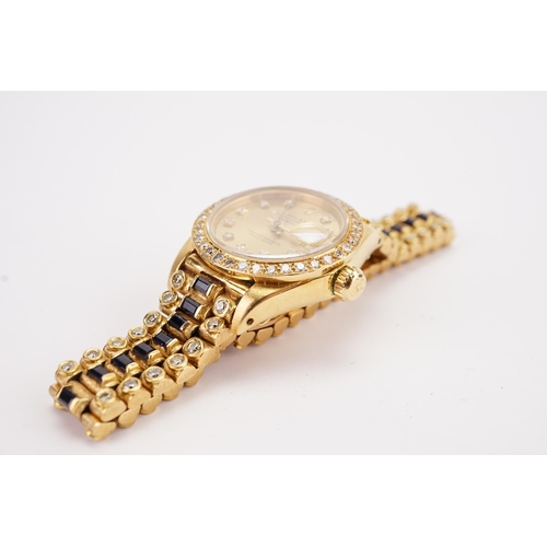 199 - An interesting 18ct gold ladies Rolex oyster date just, circa 1970's. Unique sapphire and diamond oc... 