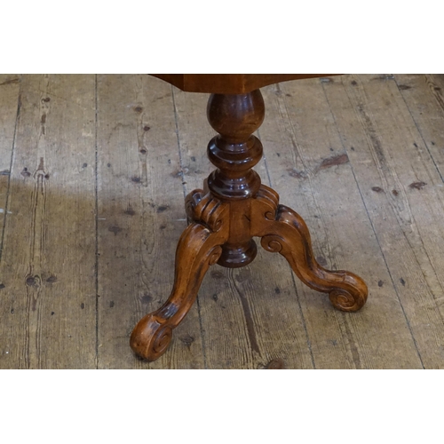 503 - An Italian Reproduction inlaid Wine Table resting on a Tripod Carved Base.