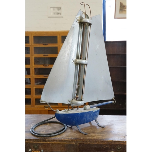 779 - A 1930s Aluminium Conservatory Heater designed as a Twin Sailed Yacht with later Blue Paint, Element... 