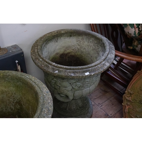 569 - A Pair of Adams Classic Design Concrete Garden Urns of Cistern, Lion Ring Handles & Ogee Base. Measu... 