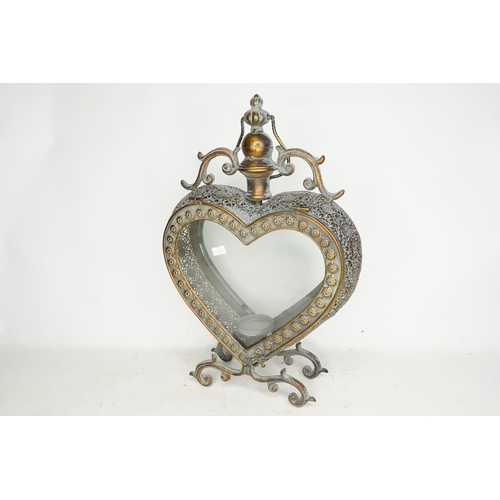 593 - An Indian Fillagree Heart Shaped Candle Holder. Measuring: 46cms high x 30cms across.