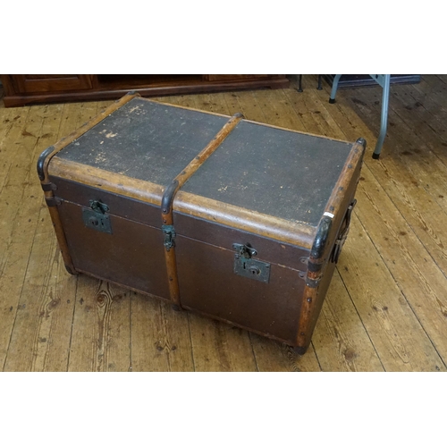 519 - A Victorian Steamed Wood & Linen Cabin Trunk with Handles. Measuring: 77cms across x 50cms deep x 44... 