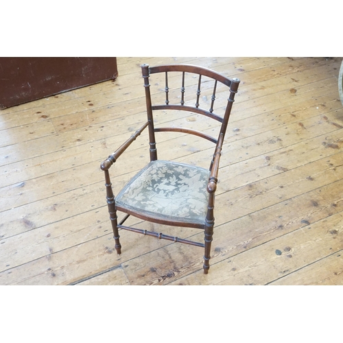 539 - A Child's Mahogany Framed Turn Wood Chair with a Damask Seat.