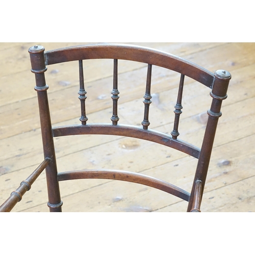 539 - A Child's Mahogany Framed Turn Wood Chair with a Damask Seat.