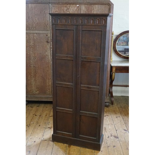 526 - A Lincolnshire Carved Fret Panelled Narrow Cabinet with Twin Panelled Doors & inner drawers. Measuri... 