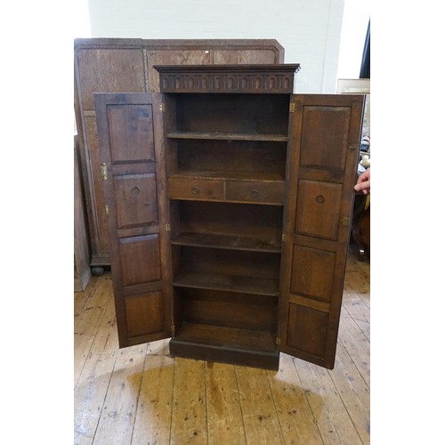 526 - A Lincolnshire Carved Fret Panelled Narrow Cabinet with Twin Panelled Doors & inner drawers. Measuri... 