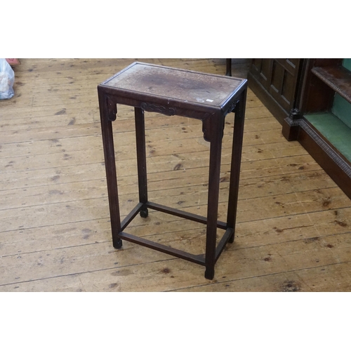 530 - A Japanese Hardwood Side Table with batwing decoration & resting on Square Legs. Measuring: 45cms x ... 