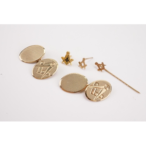 98 - A pair of 9ct gold freemason cufflinks, along with a 9ct gold freemason pin brooch. Weight 8.8g.