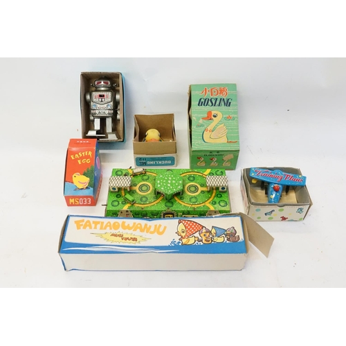 503 - A Collection of 6 x Boxed Chinese Tin Plate models to include a Gosling Duck, Captain Robot, Plane, ... 