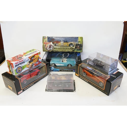 303 - A Collection of 4 x Boxed 1/18th Scale models to include Three Maisto models & a 