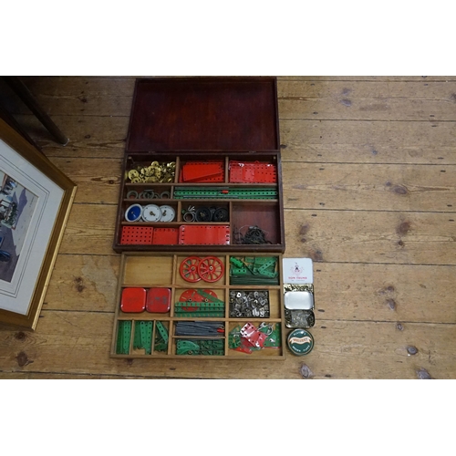 584 - A Wooden Box containing a selection of Red & Green Meccano in Excellent Condition.