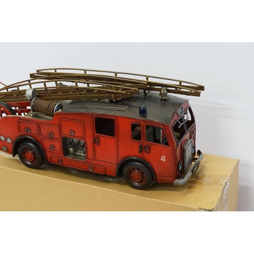 491 - A Modern Tin Plate ERF Fire Truck in Original Box. Measuring: 45cms Long.